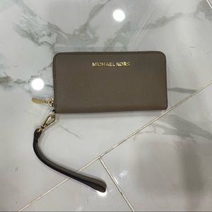 Michael Kors Saffanio leather wristlet.